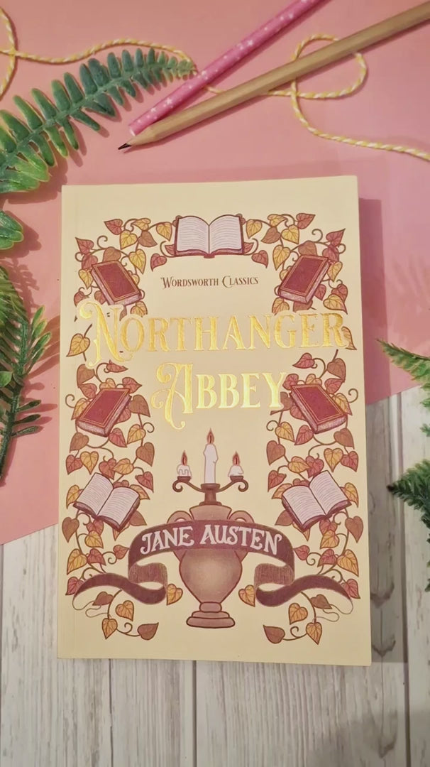 Short video showing a Morning Coffee acrylic bookmark with tassel being removed from its packaging, held up close to the camera to highlight the intricate coffee cup design, then placed between the pages of a book to demonstrate how it works as a decorative reading bookmark.